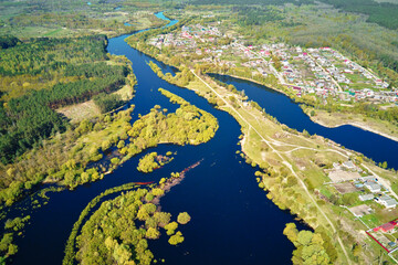River floodplain landscape and green forest, aerial view