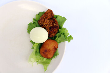 Karaage ried chicken, nugget, boiled egg, and lettuce