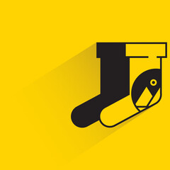 socks with branding label shadow on yellow background
