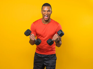 young black man laugh on weightlifting with dumbbells