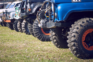 General view of 4x4 off-road vehicles built before the start of extreme competitions. Cross-country racing