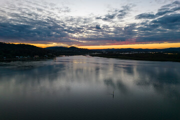 Sunrise aerial waterscape with clouds