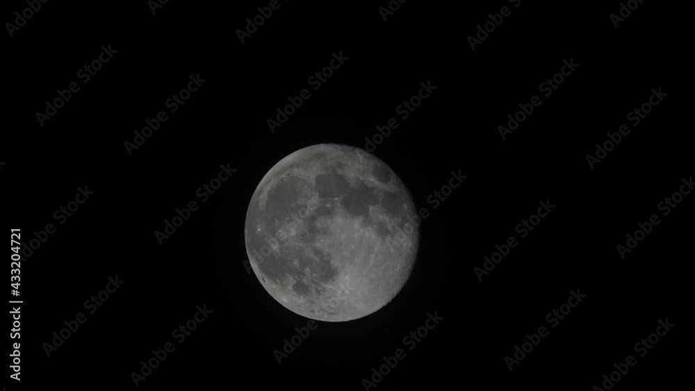 Wall mural full glowing moon with clouds