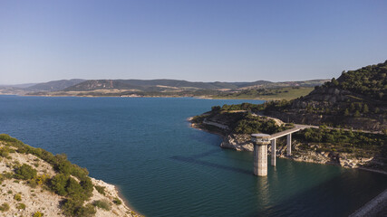 Aerial view of the reservoir and dam of Guadalcacin in Cadiz, Spain © Miguel Angel Junquera/Wirestock