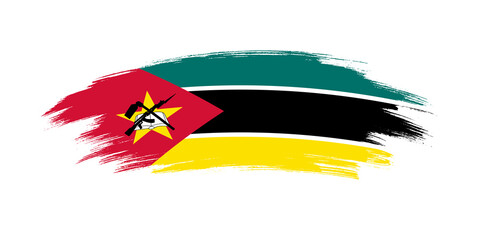 Artistic grunge brush flag of Mozambique isolated on white background