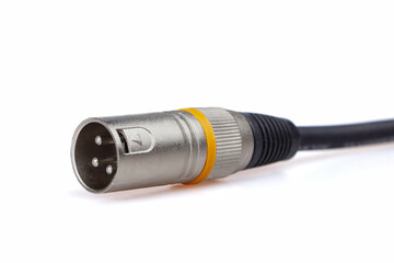 The XLR plug is used to connect a balanced audio cable. Selective focus.