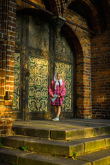 Obraz premium happy girl in purple dress, outdoor walks happy childhood selective focus