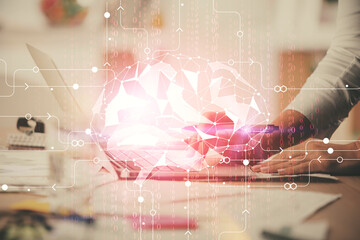 Multi exposure of woman hands working on computer and brain hologram drawing. Ai concept.
