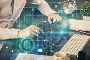 Multi exposure of man's hands holding and using a digital device and data theme drawing. Innovation concept.