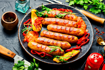 Fried sausages and vegetables