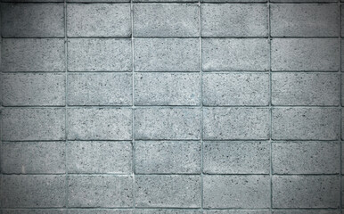 Grey color of rough texture concrete wall skin with grid pattern on cement plaster surface