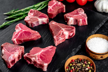 mini raw
Beef T-Bone steak on stone background