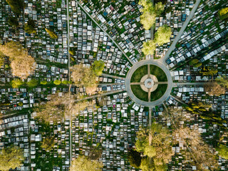 Urban Cemetery Aerial Drone View From Above. Cityscape and Colorful Pattern at Spring