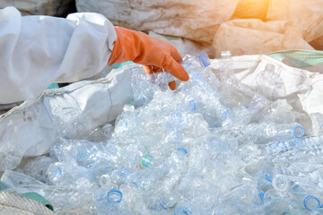 plastic bottles recycle background concept, picking up garbage plastic bottles  for recycling concept