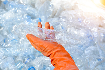 plastic bottles recycle background concept, picking up garbage plastic bottles  for recycling...