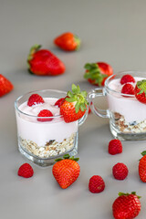 Delicious strawberry and raspberry yogurt with cereals