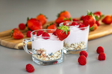 Delicious strawberry and raspberry yogurt with cereals