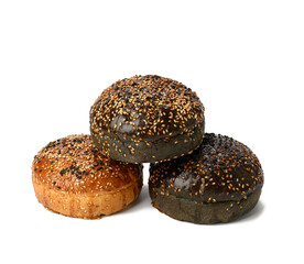 black and white baked buns with sesame seeds isolated on white background, fast food