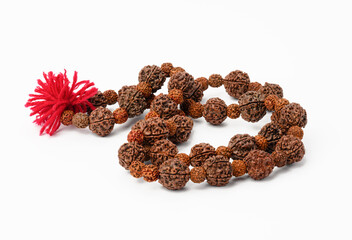 Rudraksha prayer beads for meditation on white background, top view. Japa mala