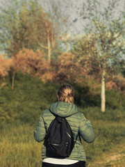 Young woman enjoying a walk in the park