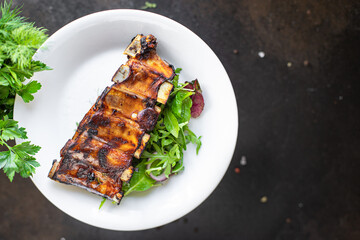 ribs glazed baked meat bbq pork fried beef or lamb sauce hot spices meal snack copy space food background rustic top view