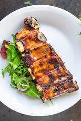 ribs glazed baked meat bbq pork fried beef or lamb sauce hot spices meal snack copy space food background rustic top view