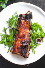 ribs glazed baked meat bbq pork fried beef or lamb sauce hot spices meal snack copy space food background rustic top view