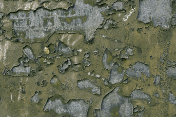 Texture of old concrete gray painted wall with peeling paint spots