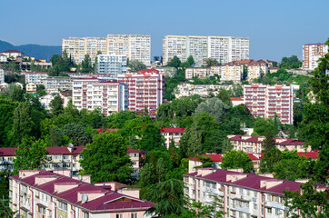 City block from above. Apartment buildings. Red roofs