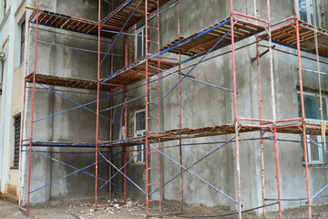 renovation or repair of a building facade using scaffolding