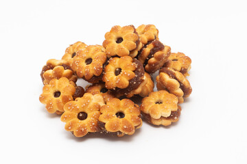 Biscuits stuffed with pineapple jam on white background, Pineapple shaped biscuits, Its sweet and sour taste and crunchy texture are popular with all ages (desserts, appetizers, snacks)