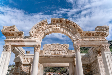 Naklejka premium Celsus Library in Ephesus in Selcuk (Izmir), Turkey. Marble statue is Sophia, Goddess of Wisdom, at the Celcus Library at Ephesus, Turkey. The ruins of the ancient antique city.