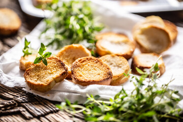 Crispy goldish bake rolls with savory flavour, served with lovely green thyme