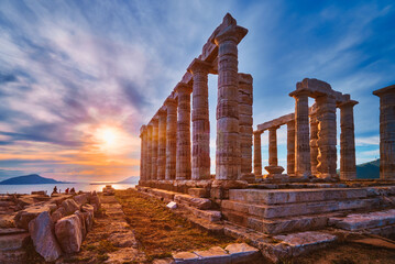 Poseidon temple ruins on Cape Sounio on sunset, Greece
