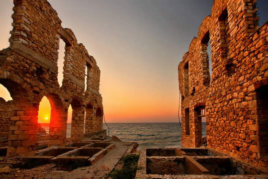 SAMOS ISLAND, AEGEAN SEA, GREECE. Sunset in an abandoned tannery in Karlovasi town. 