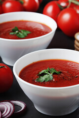 Two plates with gazpacho - traditional Spanish tomato soup