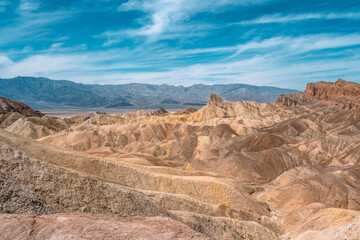 Fototapeta na wymiar Hills and unusual mountains in Zabriskie Point Death Valley National Park. Natural landscape in USA