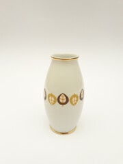 Mid-century modern porcelain vse with leaves pattern isolated