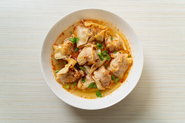 pork wonton soup or pork dumplings soup with roasted chili