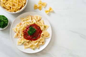 farfalle pasta in tomato sauce with parsley