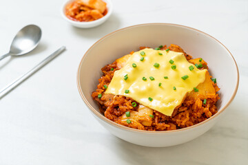 kimchi fried rice with pork and topped cheese