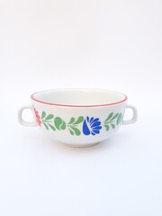 Mid-century modern porcelain cup with flower pattern isolated