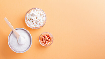 Different types of collagen for skin care flat lay on bright background, copy space