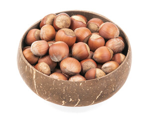 Unpeeled hazelnuts in a cup isolated on white background. hazelnuts in shell