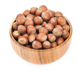 Unpeeled hazelnuts in a cup isolated on white background. hazelnuts in shell