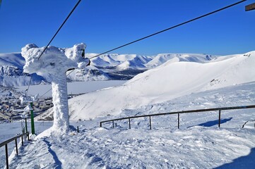 Cableway in snow covered mountains, Khibiny, Russian Federation