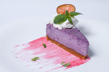 tasty cheesecake with strawberry and cream isolated