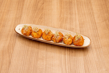 Small tray with Spanish Tapa of jerky croquettes