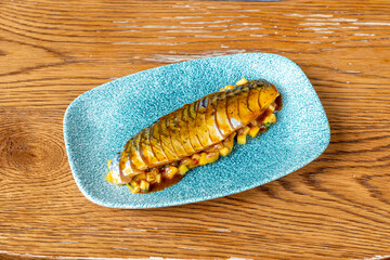 Marinated mackerel in blue plate