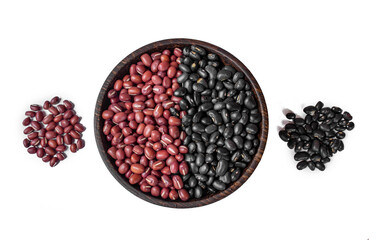 red beans and black beans in wooden bowl on white background, top view